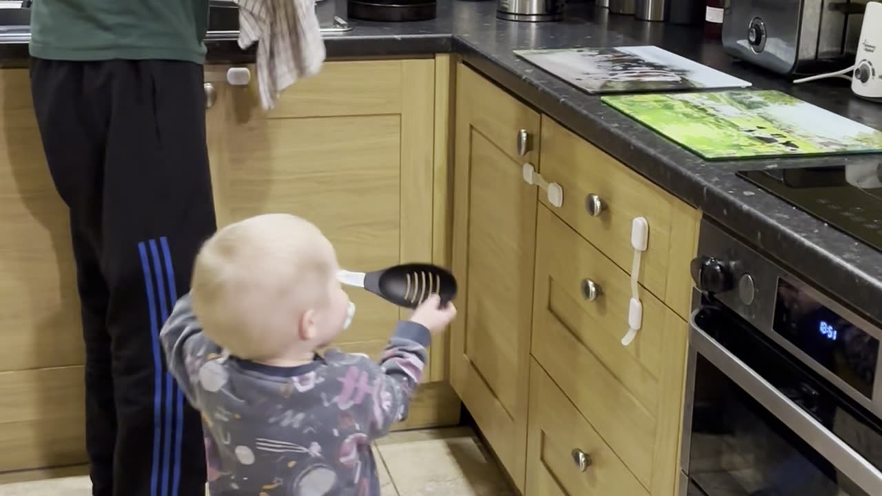 Childproofing Can't Stop Two-Year-Old From Helping in the Kitchen