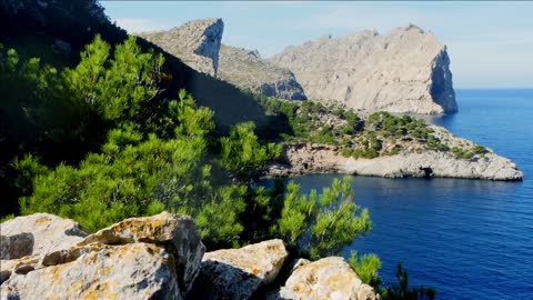 vibrant shoreline nature background rock stone cliff coast adventure scene