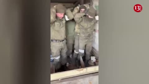 Russians hiding in a basement in Bakhmut surrender to Ukrainian fighters