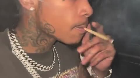 Wiz Khalifa raps