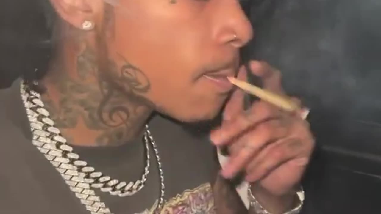 Wiz Khalifa raps