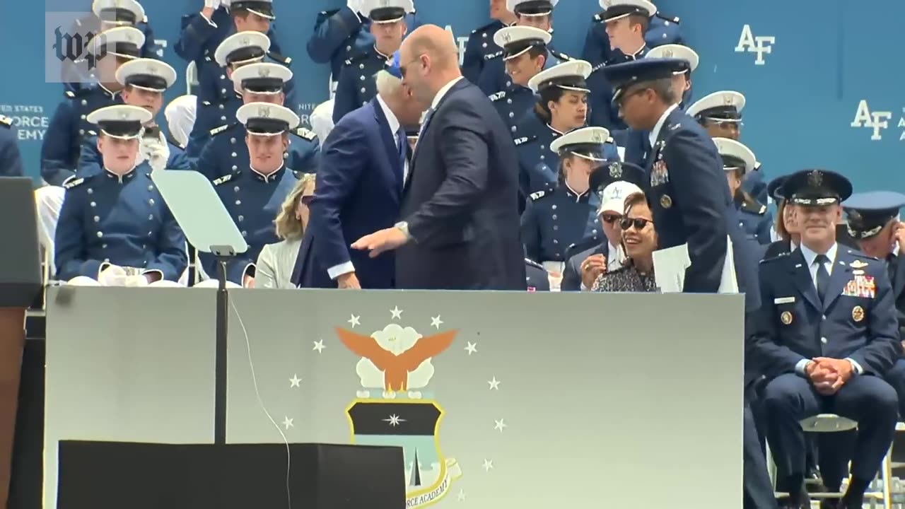 Biden falls at Air Force Academy graduation ceremony