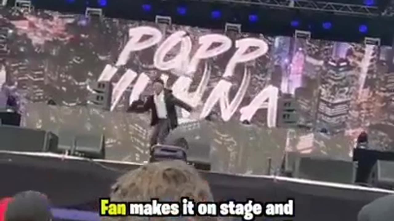 Fan Steals Mic From Popp Hunna