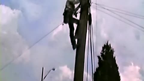 Circa 1989 - American Cablevision Repairman Climbs the Telephone Pole