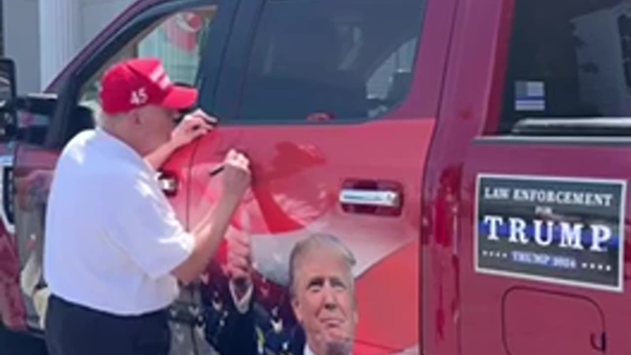 Trump signing truck