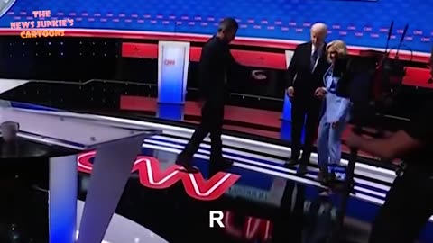 Nurse Jill escorts Joe off the stage after debate