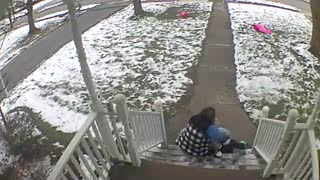 Mother and Daughter Slip and Fall Down Icy Steps