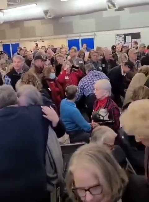 Texans grabs a Pro-Palestinian activist attempting to disrupt Texas Governor Greg Abbot.