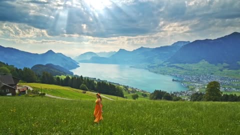 Love Swiss summer, large green grassland, blue lake, warm