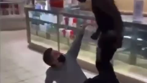 Man Randomly Beats Up Another Guy In Clothing Store