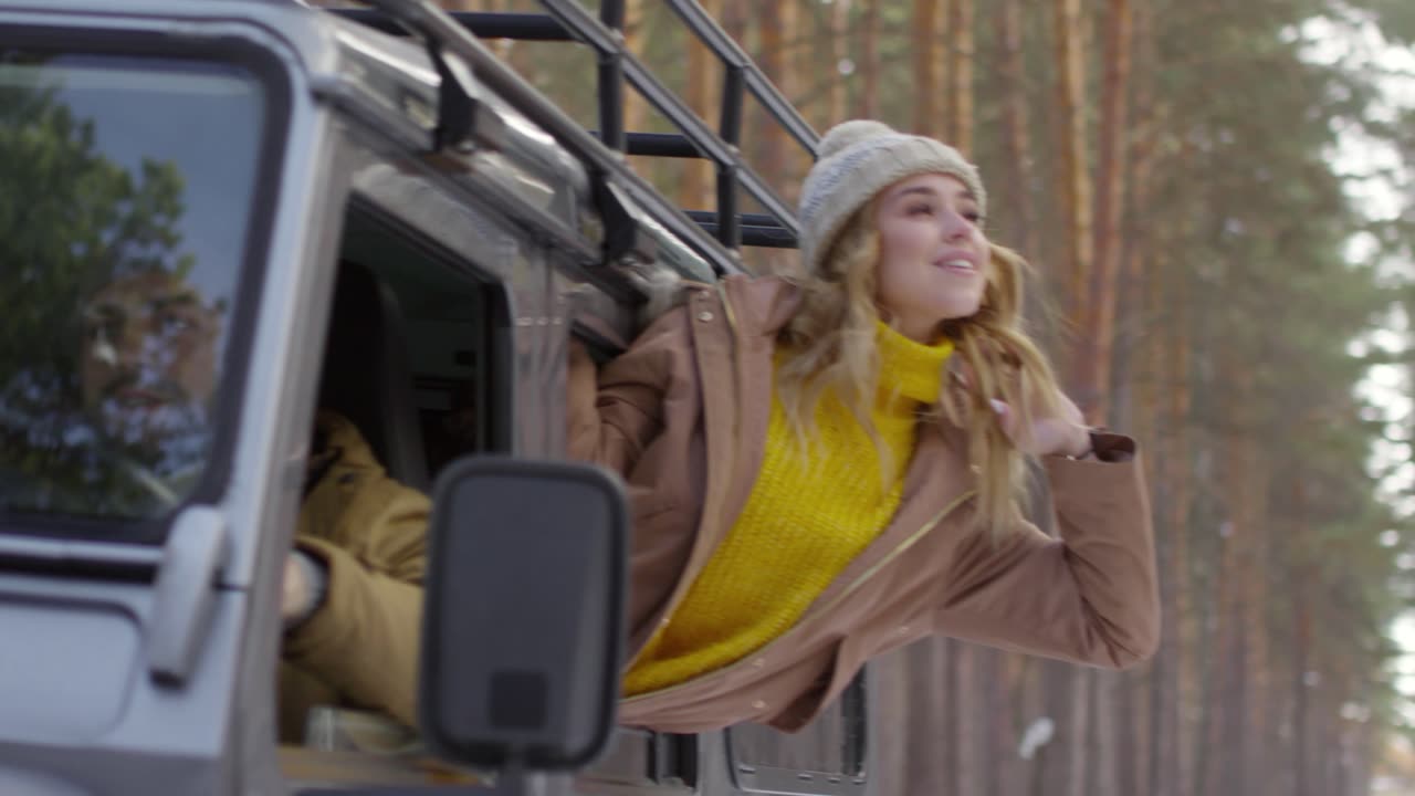 Woman's Joyful Delight as She Soaks Up the Fresh Air