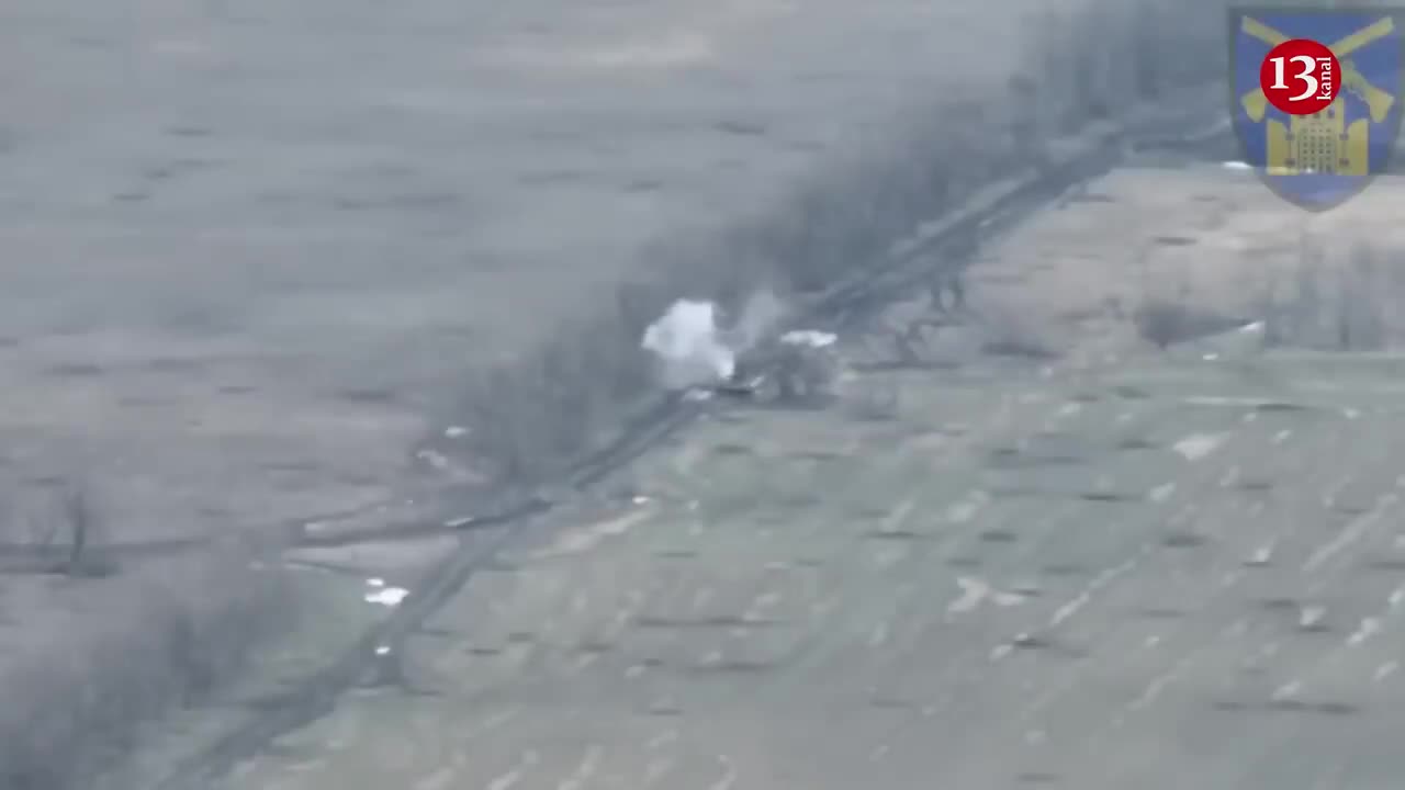 Moving Russian armored personnel carrier came face to face with a kamikaze-drone