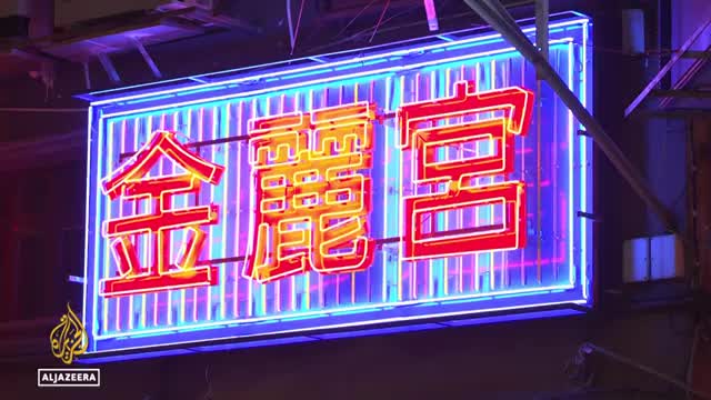 Hong Kong community groups fight to preserve iconic neon signs
