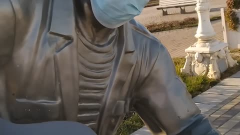 I saw a mask on the statue