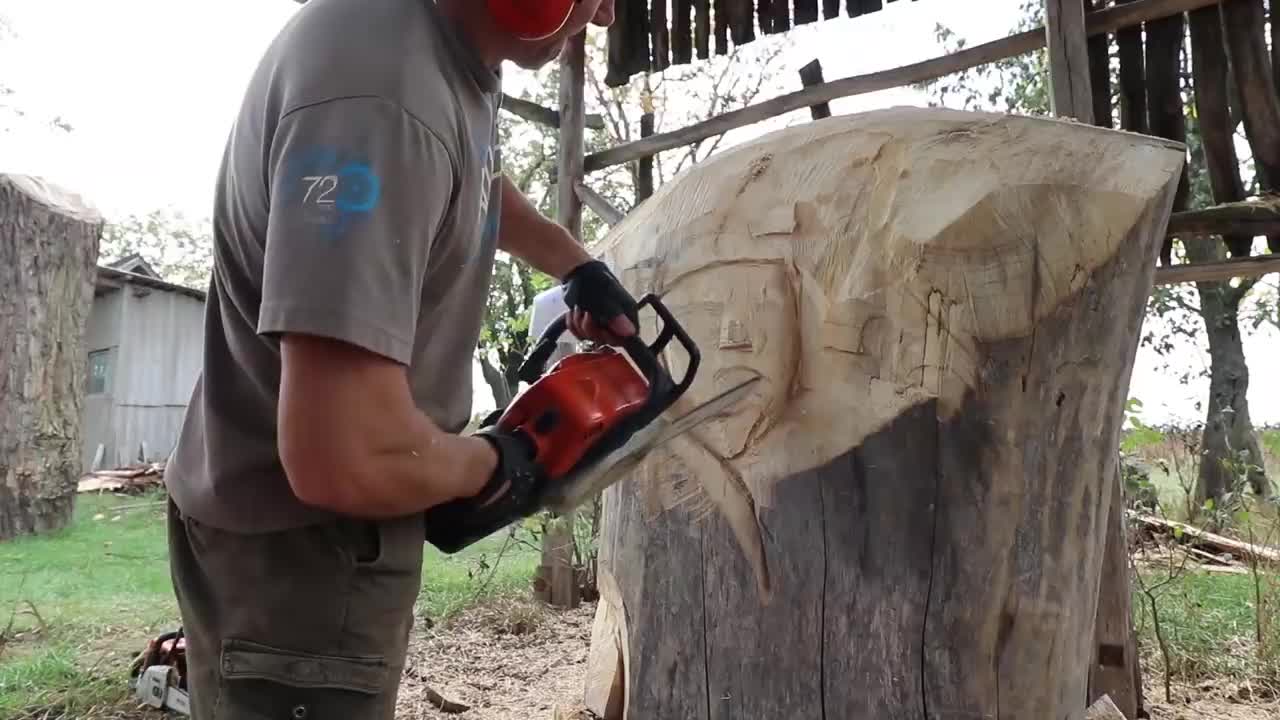 AMAZING CHAINSAW wood carving, Native American with wolves