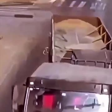 This Is The Luckiest Cyclist Ever As A Truck Runs Him Over