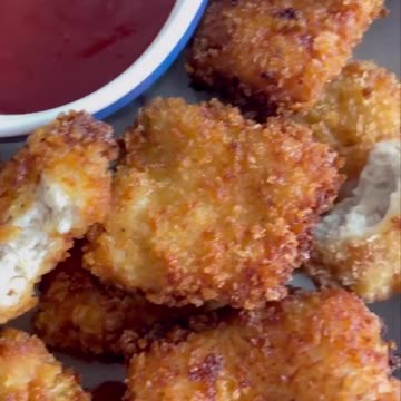 "Crispy Delights: Unveiling the Savory Secrets of Chicken Nuggets"