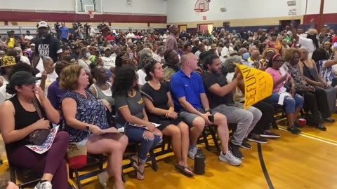 Fed up Chicago residents shout down the Mayor as he pitches building a new colony for illegals.