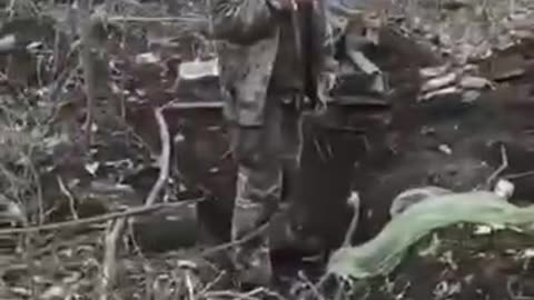 Russian Soldiers Machine Gun a Ukrainian POW