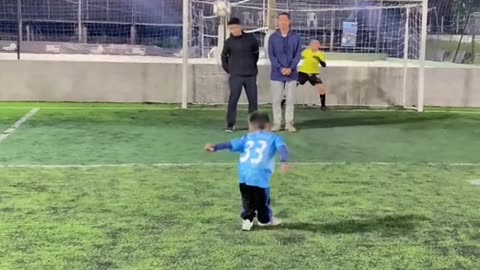 Toddler scoring free kicks and celebriting suiiiiiii