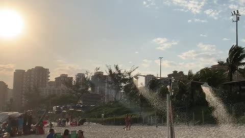 Morning Glory Cloud Passes Over Brazilian Beachgoers