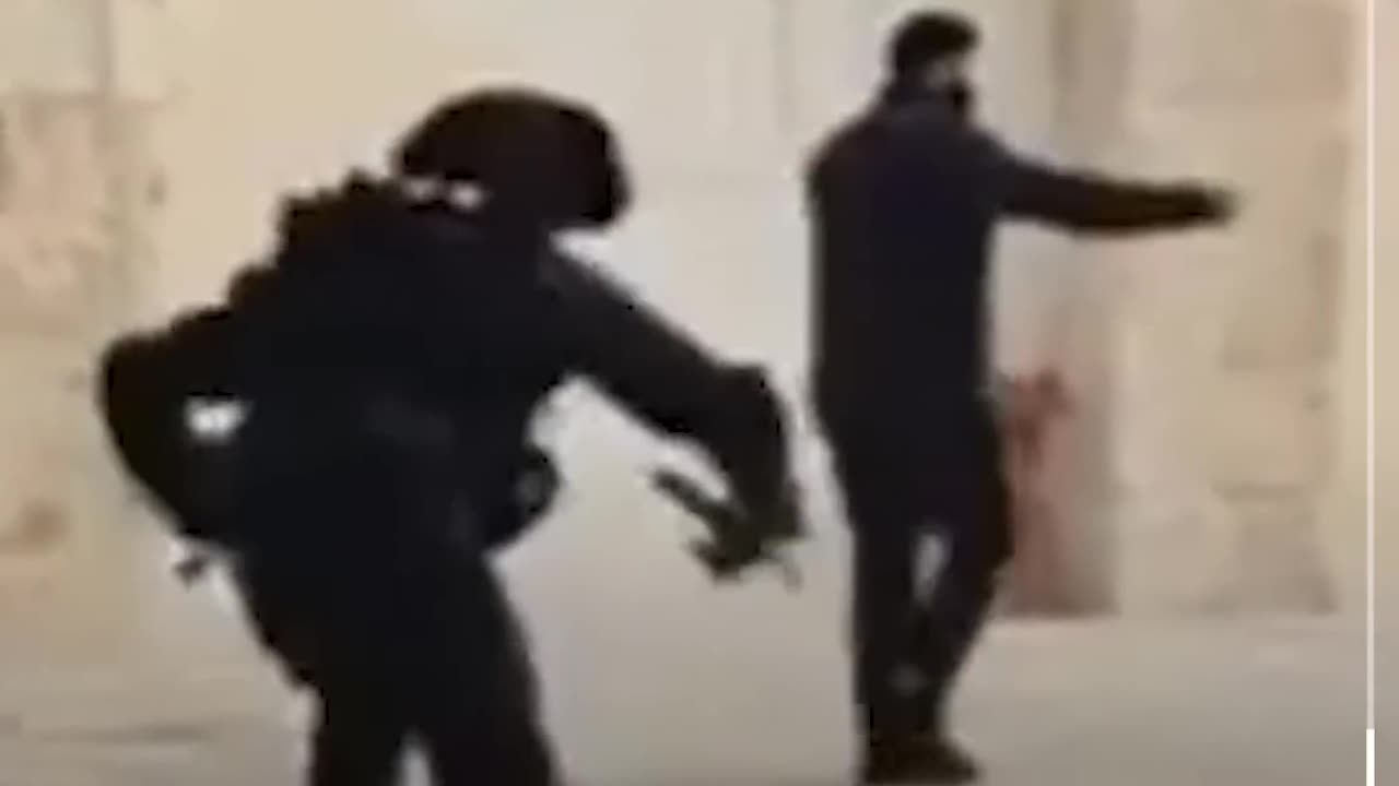 Israeli forces attack Palestinian father and man on crutches in al-Aqsa