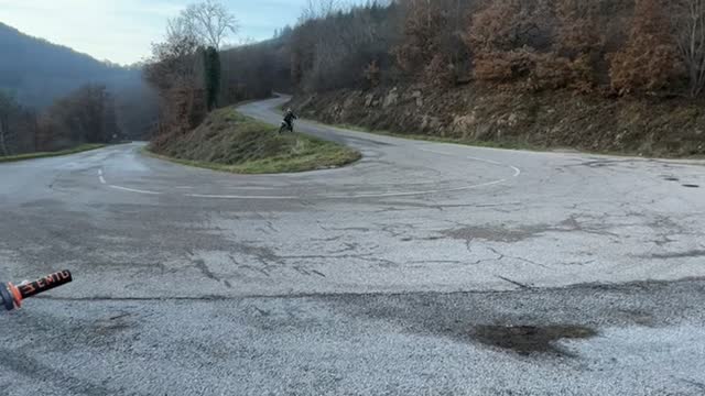 Dirt Biker Nearly Crashes on Grass Embankment