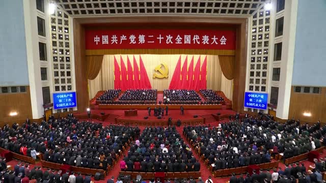 Former China Leader Helped on Stage at Opening Ceremony