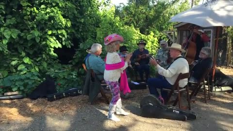 Patricia Dancing to the "Wood Chip String Band"