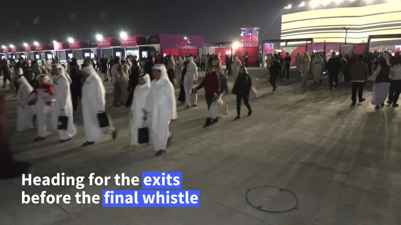 Ecuador supporters celebrate after beating hosts Qatar .