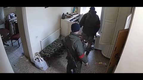 Russian invaders looting a house