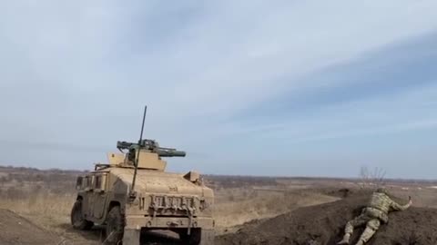 Firing a TOW Missile Mounted on Humvee