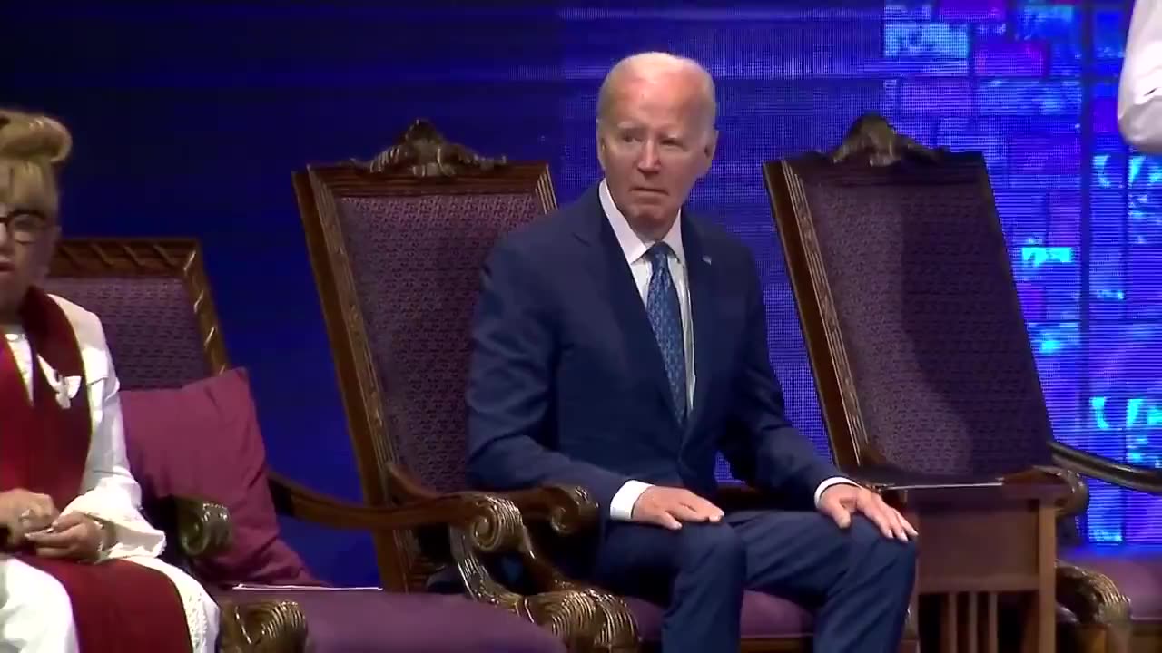 A confused Looking Joe Biden isn’t sure when to stand at Church