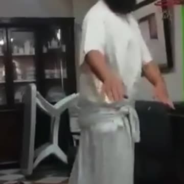 A Muslim brother dances to music