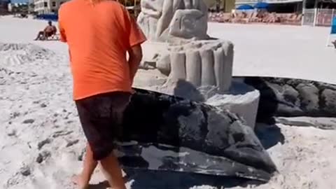 Elaborate Sand Structure Collapses After Artist Removes Support From After Completing it