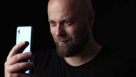 Man watching his smartphone