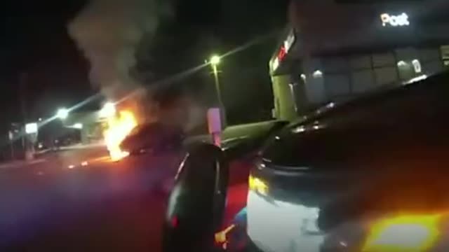 Police rescue woman from burning car 22