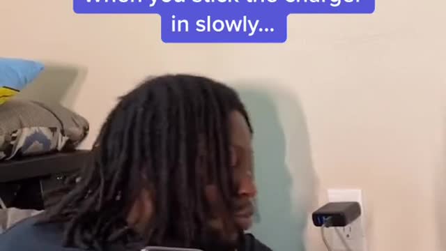 When you stick the charger in slowly...