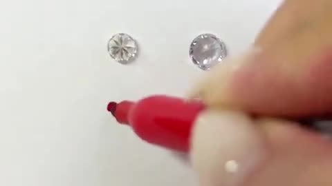 How to tell if a diamond is real or fake using The Dot Test