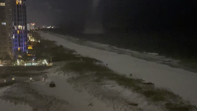 Water Spout Climbs onto Land and Dissipates