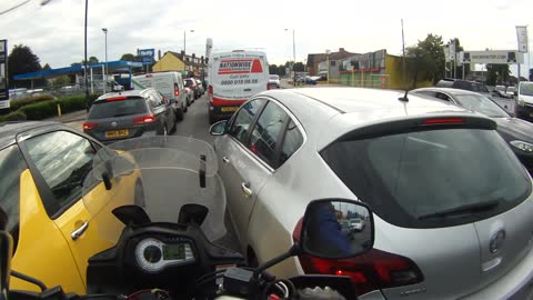 Car Driver Deliberately Runs Over Motorcyclist's Foot