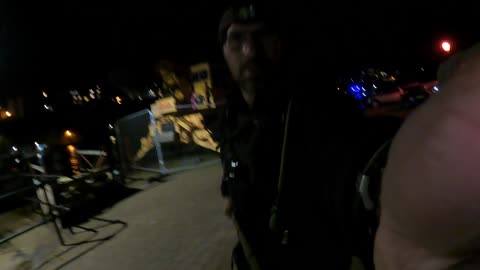 Adjusting camera of the Go pro at Tenby harbour. At night..Oct 2022