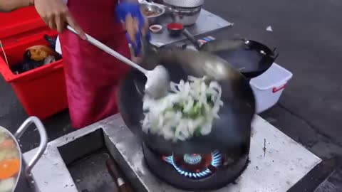 The cook greased the pan before frying the vegetables.