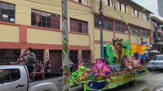 Spray Foam Flies Freely at a Carnival Parade in Ecuador