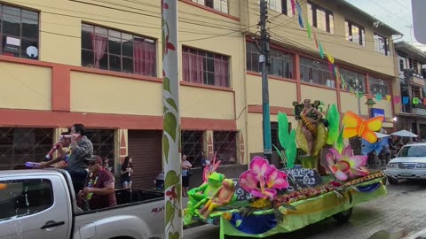 Spray Foam Flies Freely at a Carnival Parade in Ecuador