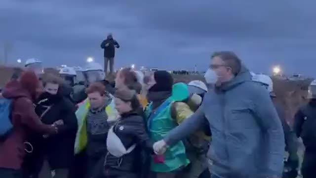 Greta Thunberg dragged away by POLICE after anti-coal mine