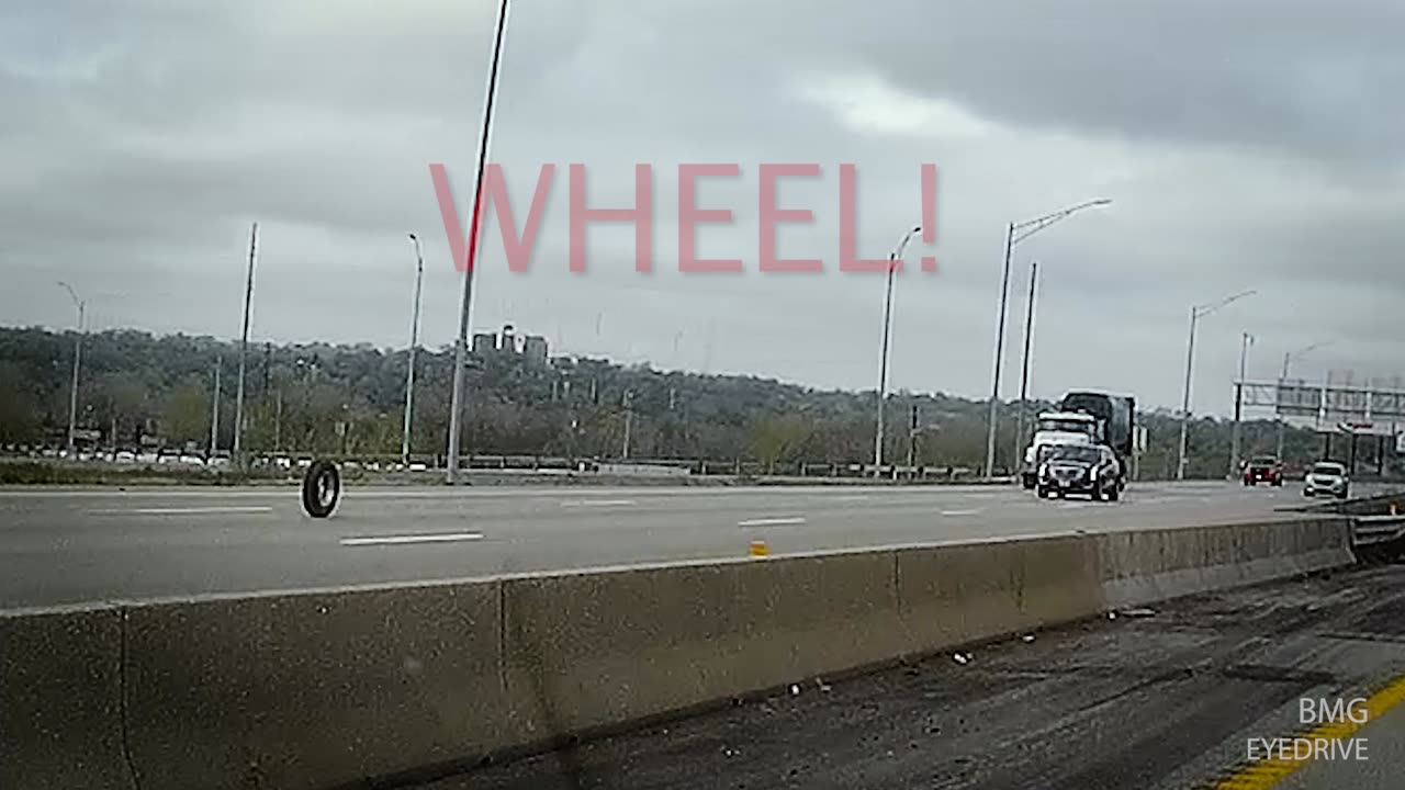 Truck Wheel Rolling Down Highway!