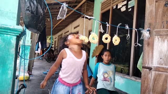 the excitement of the girl eating crackers