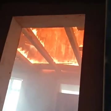 UAF shelter is on fire after being hit by a Russian artillery shell