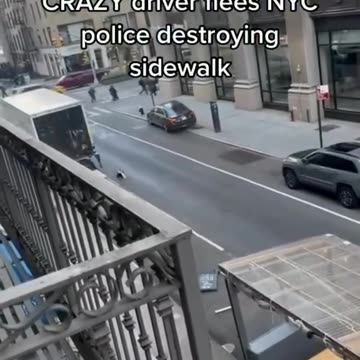A driver flees NYC police destroying sidewalk.
